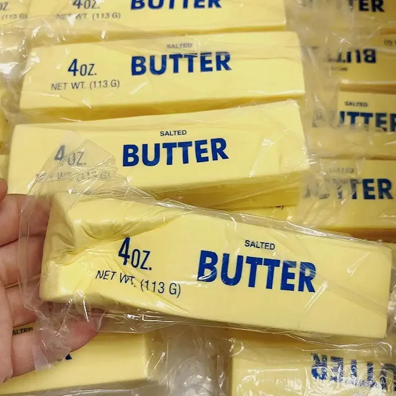 Butter stick fidget being stretched between two hands
