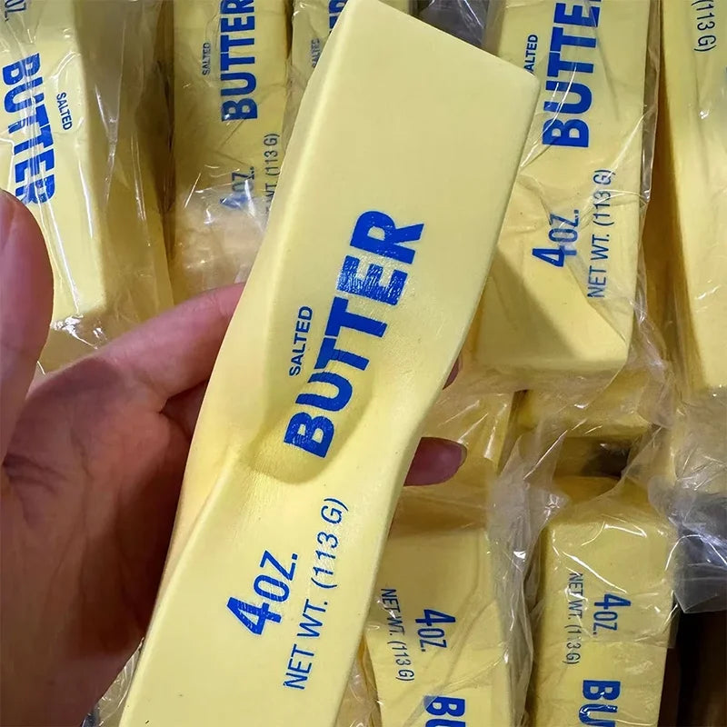 Butter fidget toy shown at desk scale