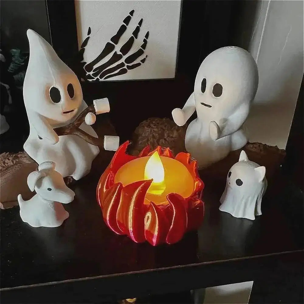 Close view of the hooded ghost figure and campfire detail