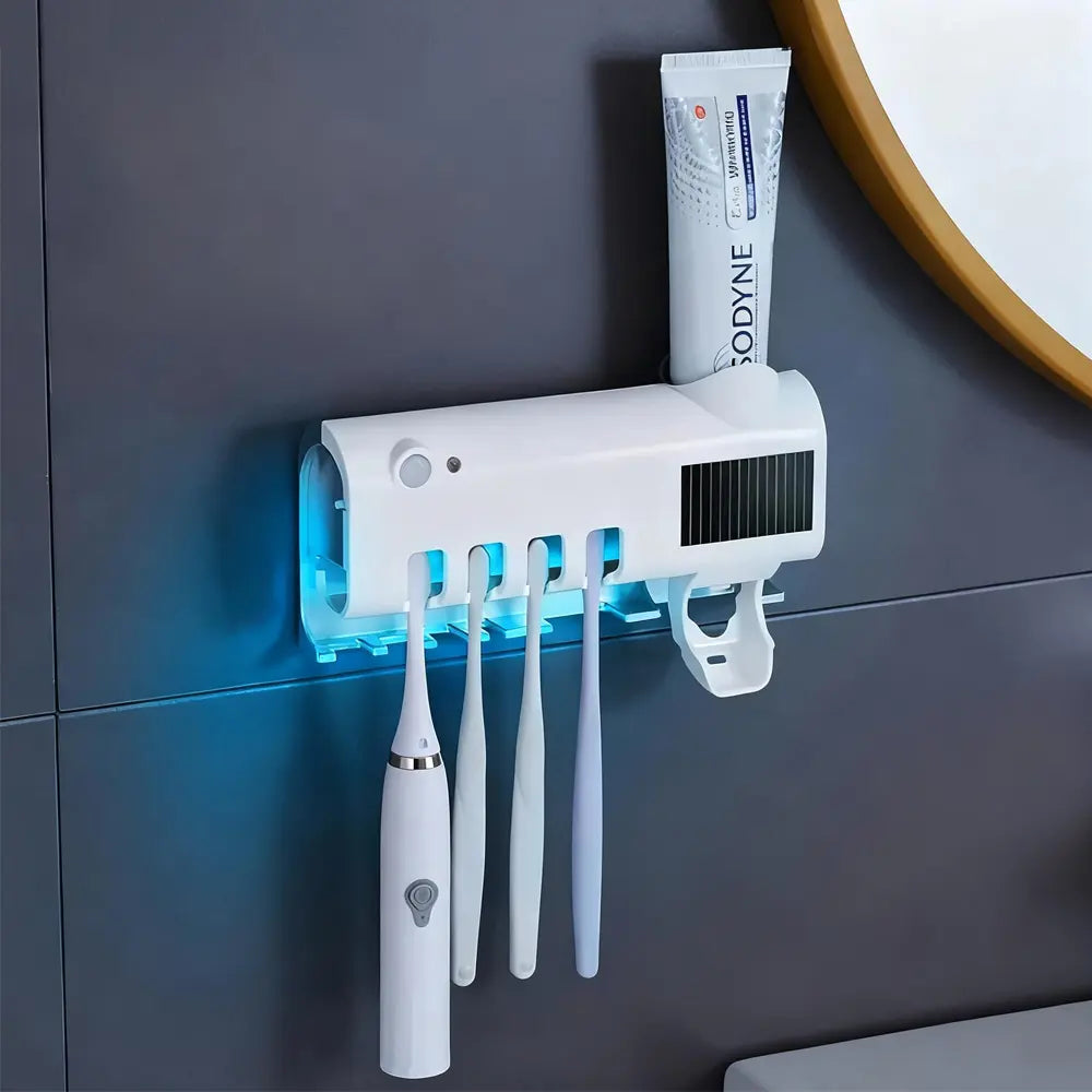 Wall mounted UV toothbrush holder with toothpaste dispenser